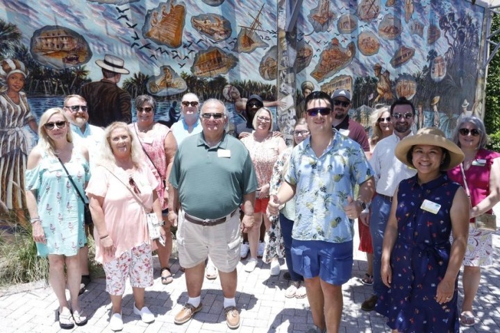 a group of people posing for the camera