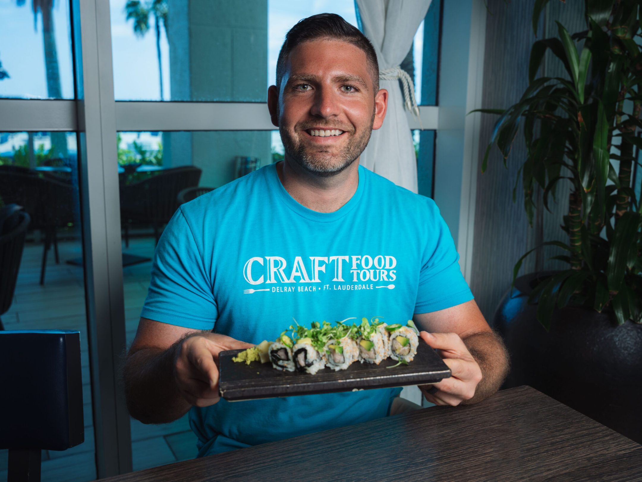 a man in a blue shirt