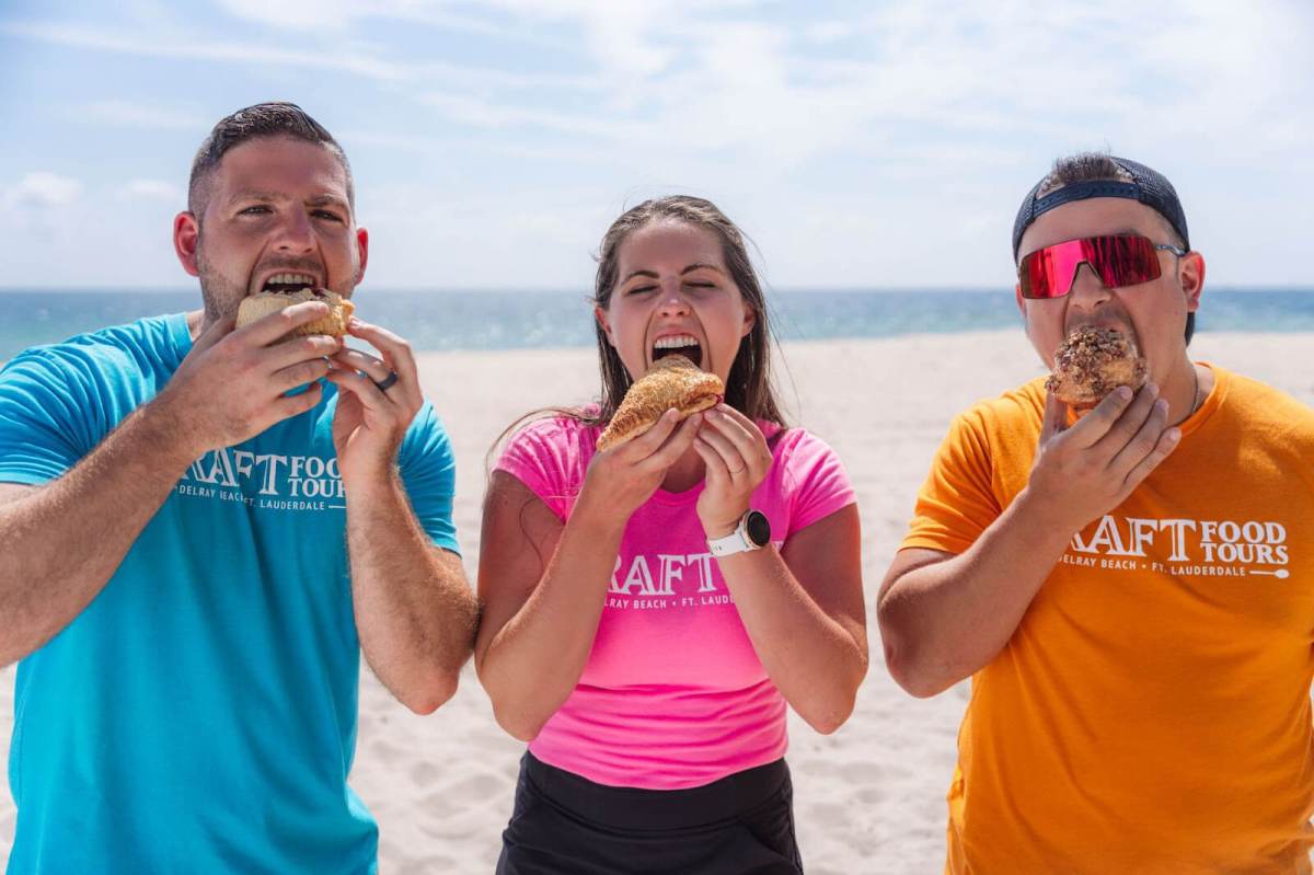 Team a couple of people that are eating some food