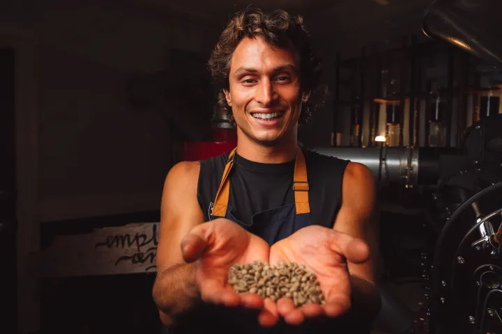 a person holding a plate of food