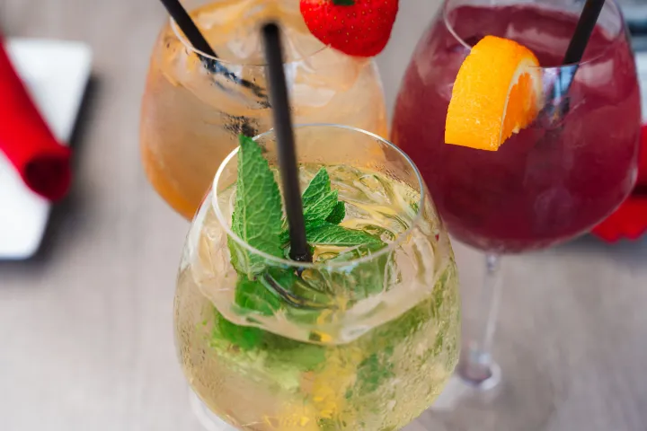 a close up of a glass of orange juice